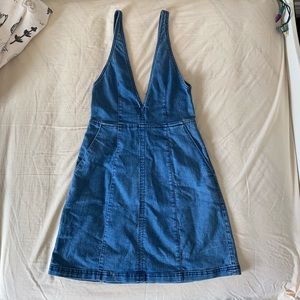 Denim mini dress with a V neckline & low back